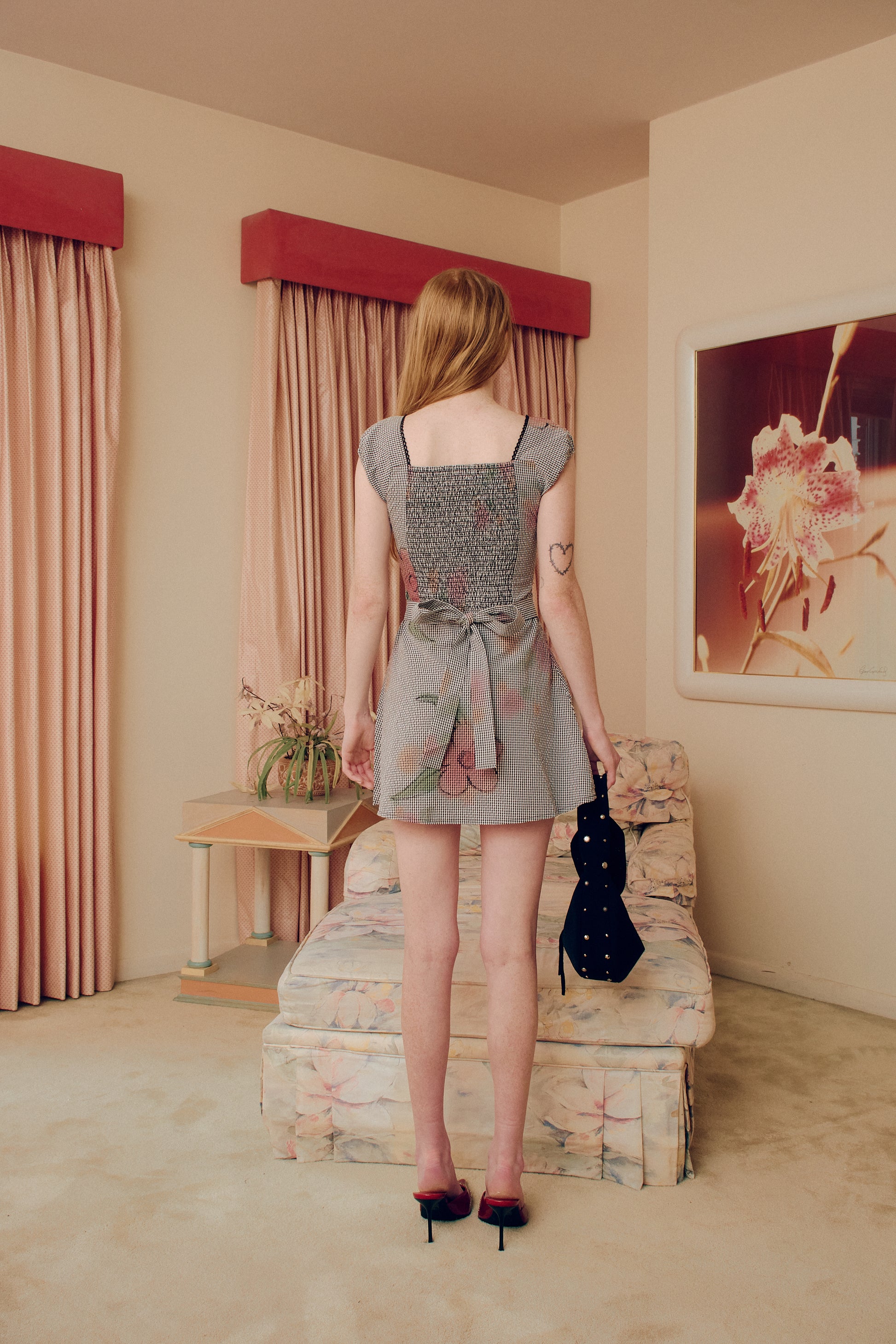 Introducing our Flower Gingham Dress, featuring a timeless gingham pattern and delicate flower embroidery. This dress exudes elegance and sophistication, perfect for any occasion. Made with high-quality materials, it offers both comfort and style. A must-have for any fashion-forward individual.