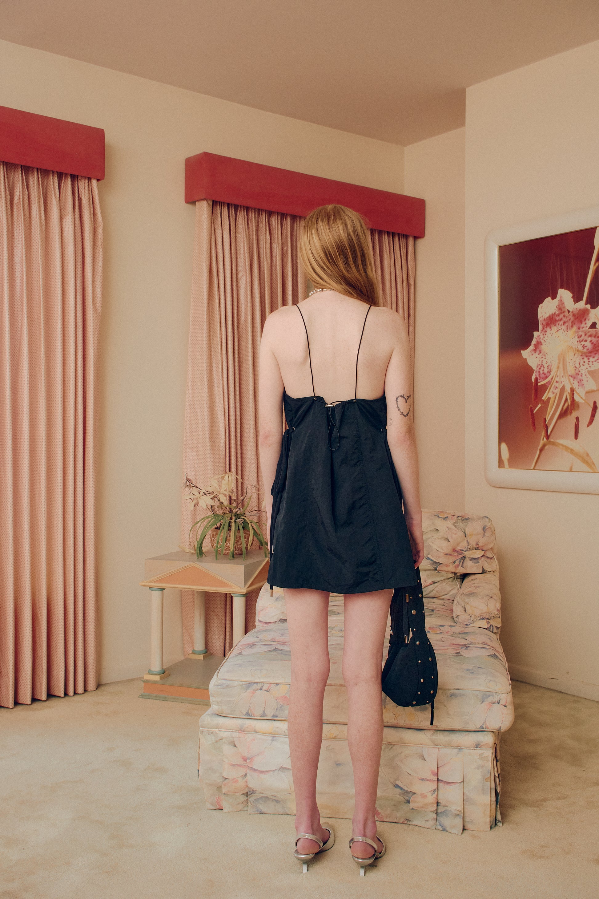 Indulge in luxury with our Black Slow Dress. The rich black hue and elegant slow flow of this dress make it a timeless addition to your wardrobe. Perfect for any occasion, this dress will make you feel confident and sophisticated. Elevate your style with the Black Slow Dress.