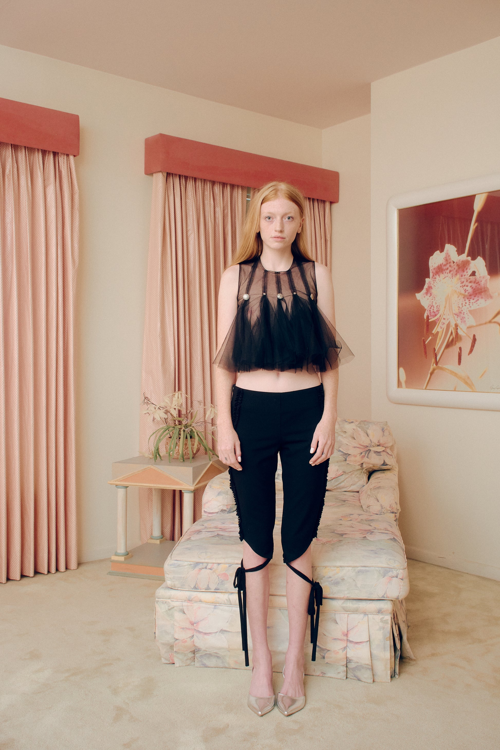 Add a touch of sophistication to your wardrobe with our Open Button Flare Top. The unique design featuring open buttons adds an elegant and exclusive touch to any outfit. Crafted with high-quality materials for a luxurious feel, this top is perfect for any fashion-forward individual.