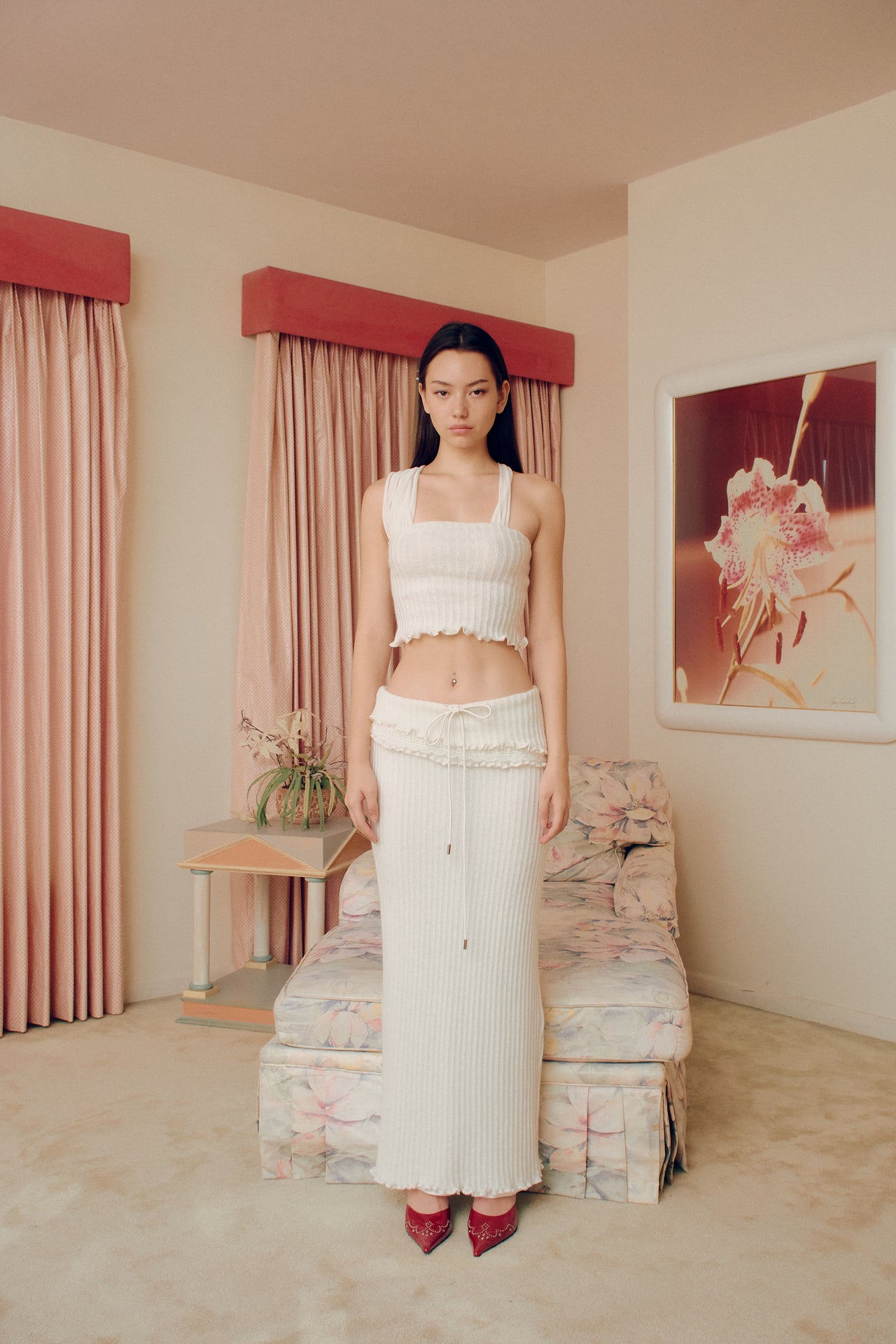 Indulge in the elevated elegance of our Milky Knit Long Skirt. Made with a luxuriously soft fabric, this skirt drapes beautifully and moves with you for a comfortable yet sophisticated look. The versatile design makes it perfect for any occasion, adding a touch of luxury to your wardrobe.
