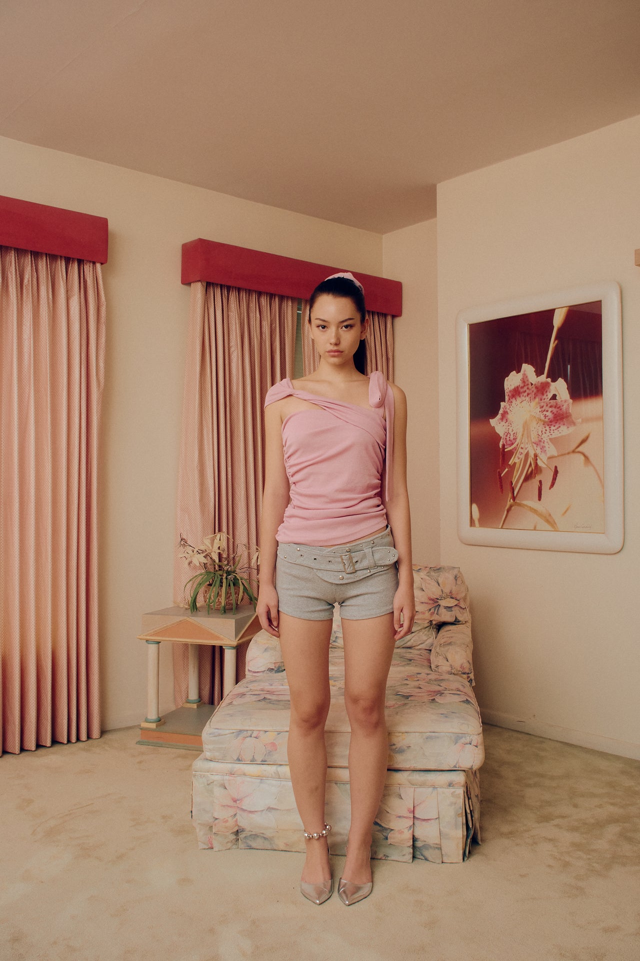 Get ready for a lovely day in style with our Heart Tie Asymmetric Top! The quirky pink design features off-shoulder ribbons for a touch of fun. Simply throw on this top and you're all set for some serious comfort and cuteness!