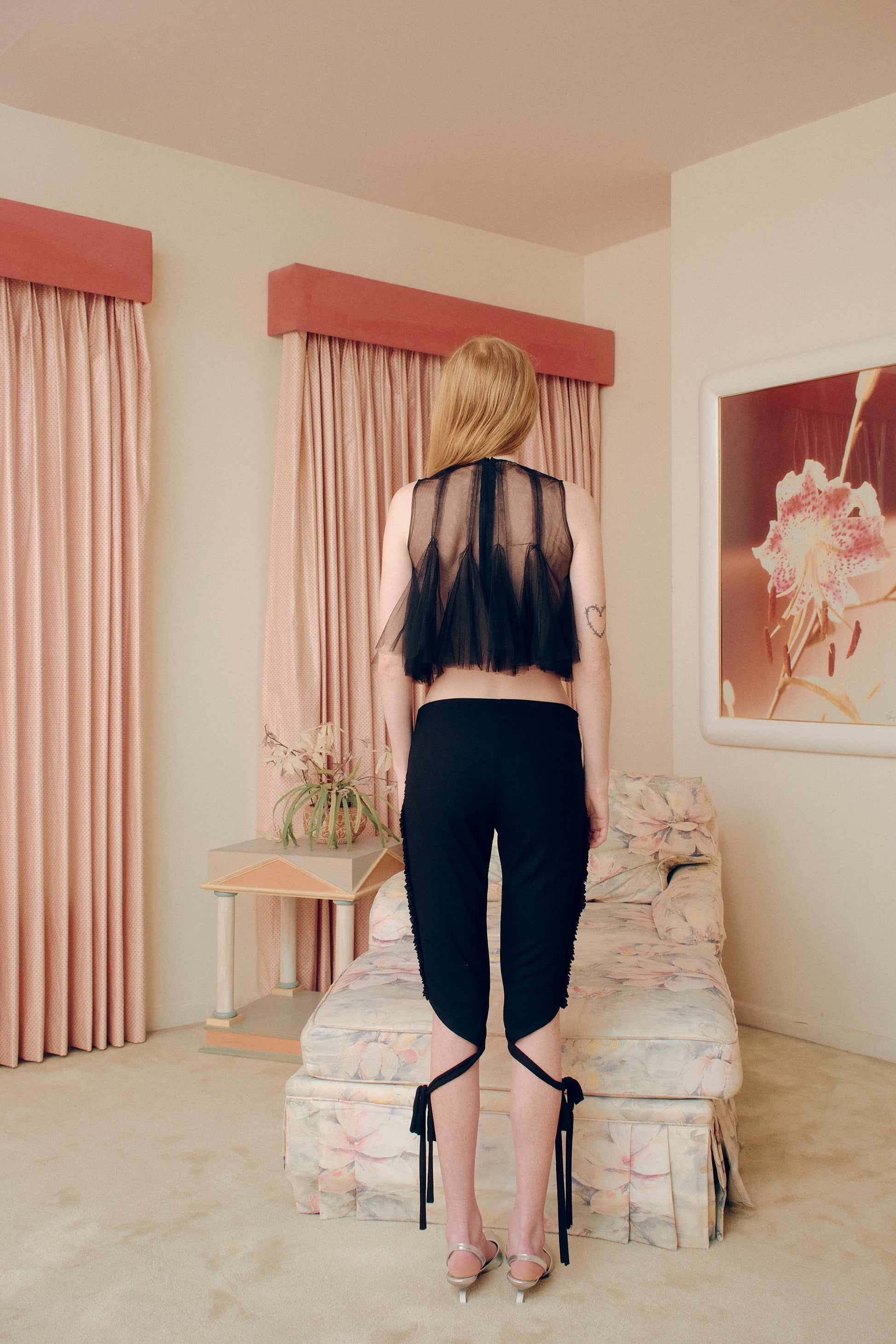 Elevate your style with our Luv Knot Capri Pants. Made with luxurious fabric, these pants offer a sleek and sophisticated look. The elegant knot detail adds a touch of artistry, making them a must-have for any fashion-forward wardrobe. Experience luxury and comfort in one with our Luv Knot Capri Pants.