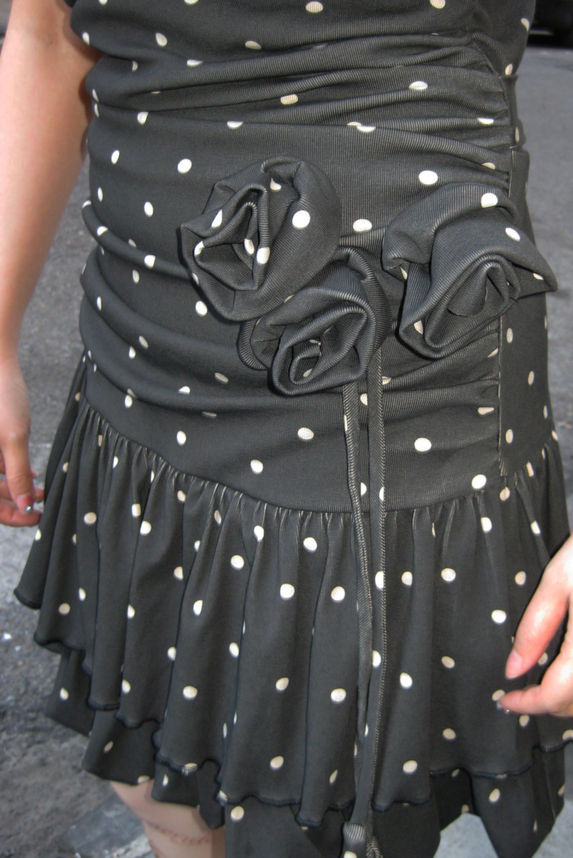 Find ultimate comfort and embrace an iconic look this spring and summer with our Midnight Polka Bloom Dress! The smocking on the back provides extra stretch and the adjustable tie ribbon in the center back adds a charming touch. Elevate your style with this versatile dress.